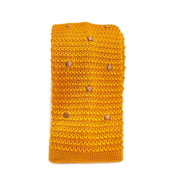 Golden knitted tie with polka dots